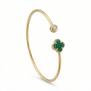 กำไลข้อมือทองคำแบบเปิดประดับหินมาลาไคต์และเพชร (Open Gold Bracelet Decorated With Malachite And Diamonds.)